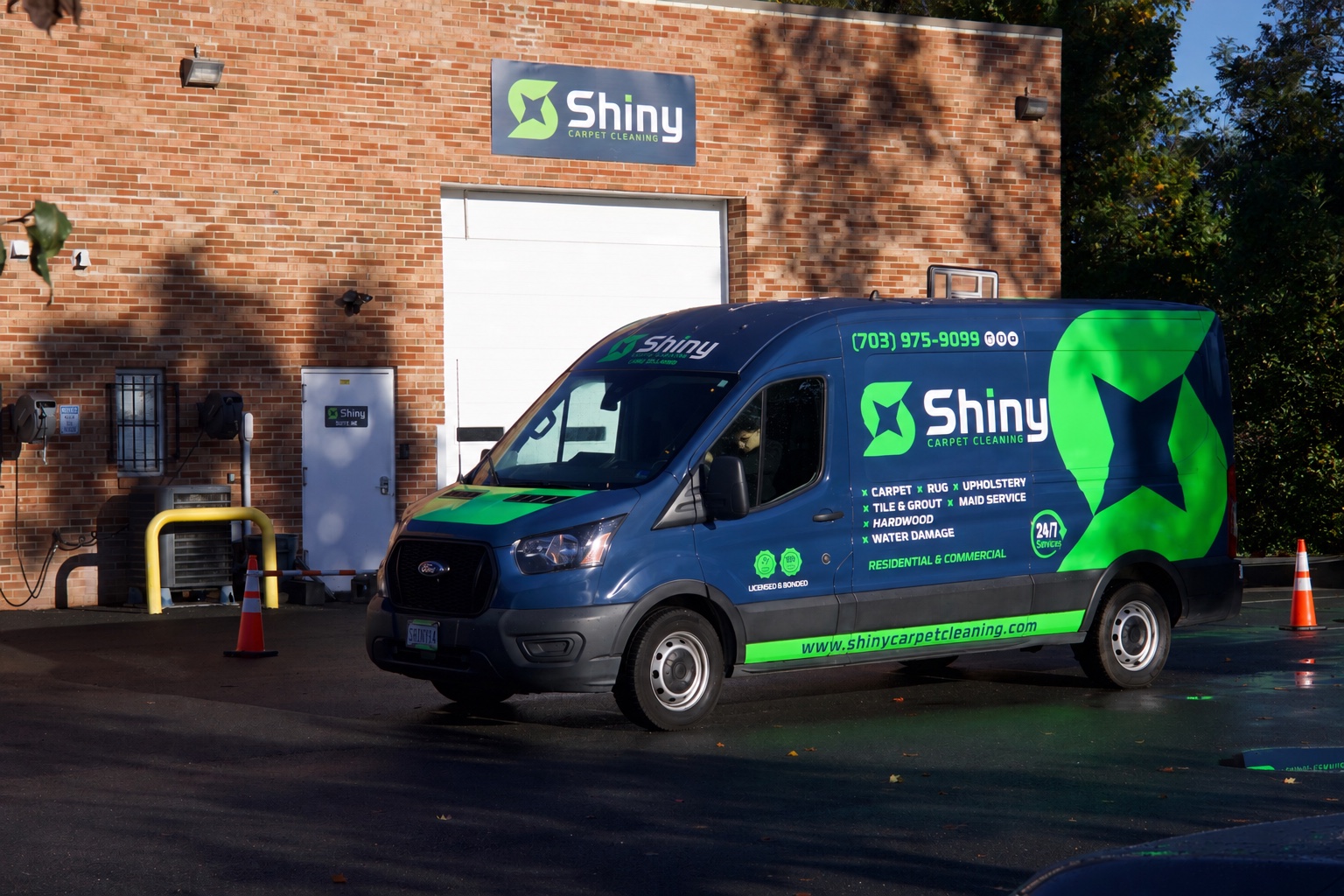 Shiny Carpet Cleaning vans outside the Shiny facility